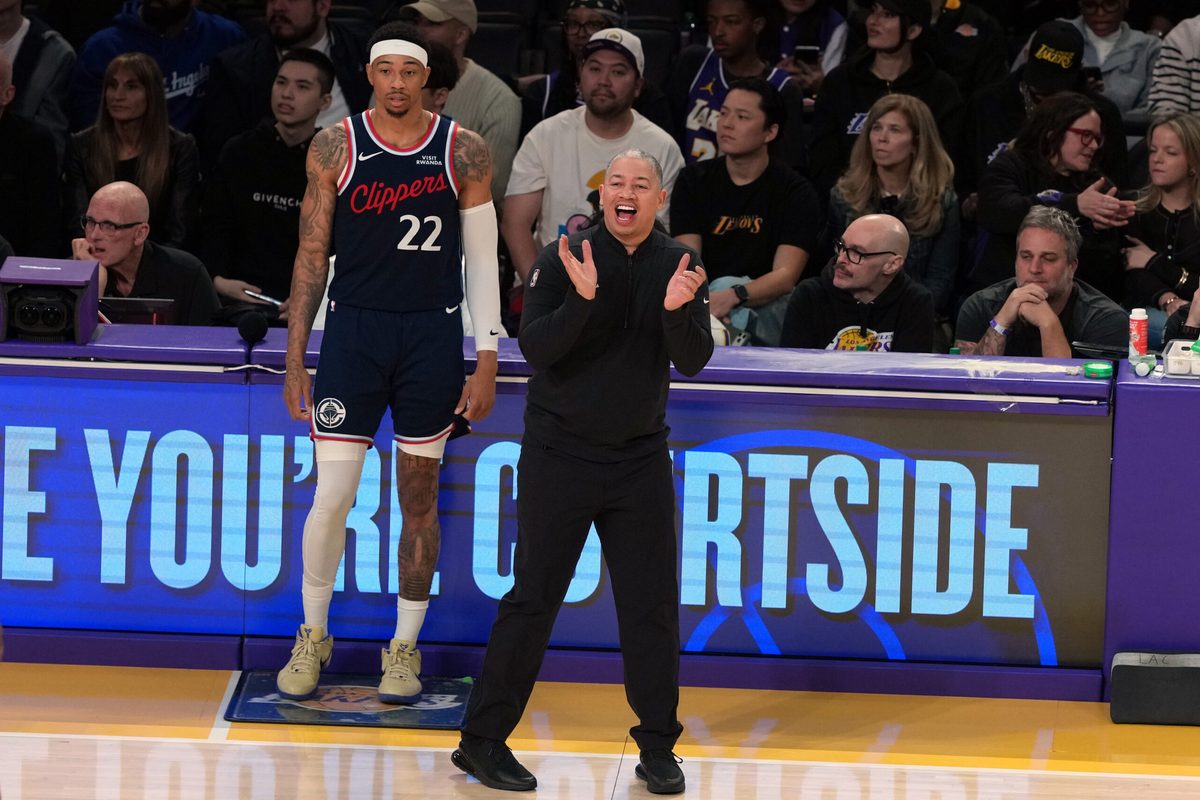 Feb 20, 2026; Los Angeles, California, USA; LA Clippers head coach Tyronn Lue and guard Jordan Miller (22) react against the Los Angeles Lakers in the second half at Crypto.com Arena. Mandatory Credit: Kirby Lee-Imagn Images