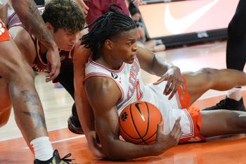 Clemson sophomore forward RJ Godfrey (0) recovers a loose ball near Florida State University forward Alex Steen (25) during the second half at Littlejohn Coliseum in Clemson, S.C Saturday, February 21, 2026.