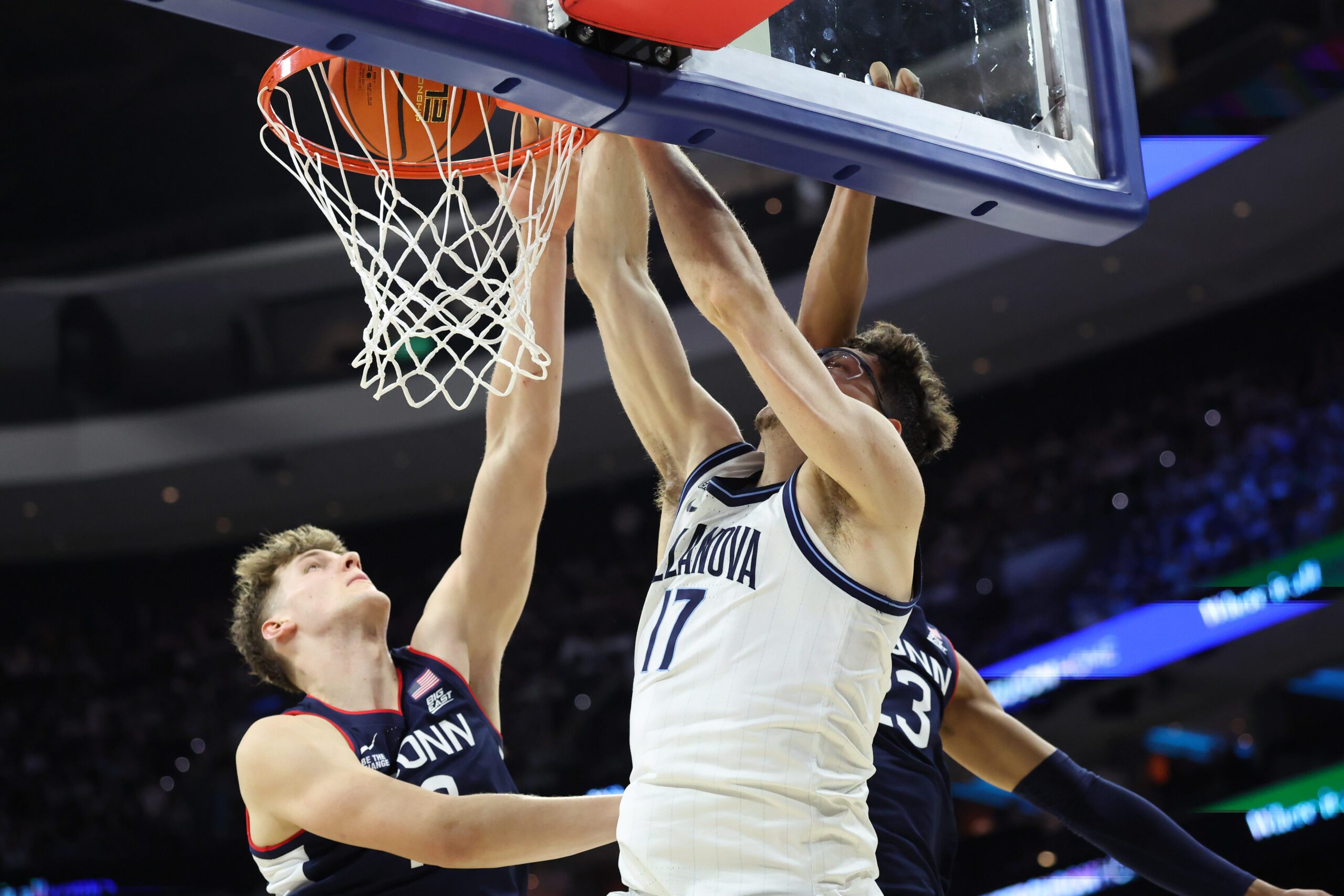 Feb 21, 2026; Philadelphia, Pennsylvania, USA; Villanova Wildcats center Braden Pierce (17) dunks the ball against the UConn Huskies during the second half at Xfinity Mobile Arena. Mandatory Credit: Bill Streicher-Imagn Images