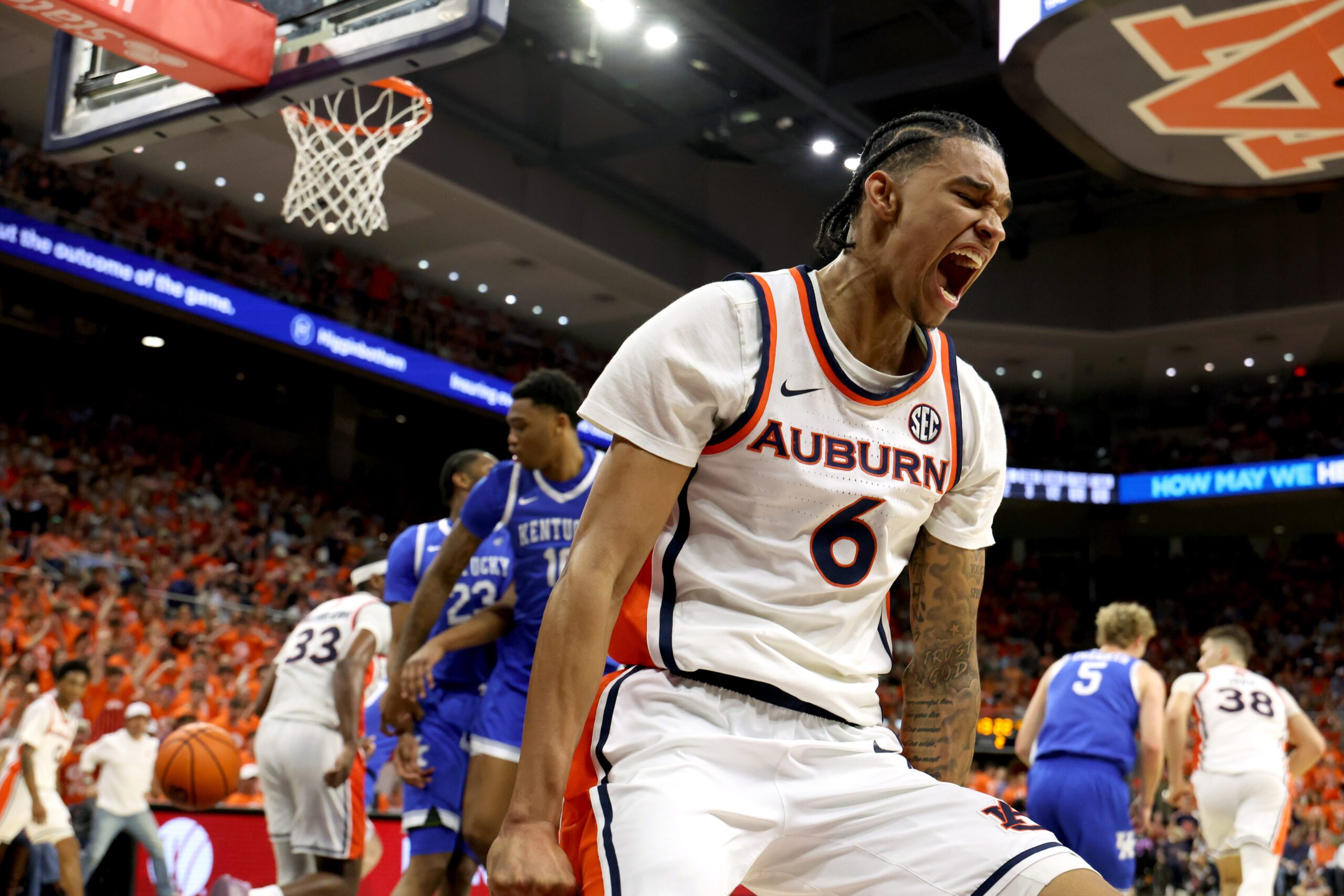 Feb 21, 2026; Auburn, Alabama, USA;  Auburn Tigers guard Elyjah Freeman (6) reacts after making a dunk on the Kentucky Wildcats during the second half at Neville Arena. Mandatory Credit: John Reed-Imagn Images