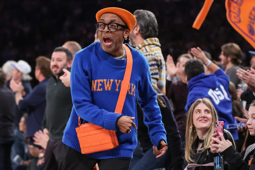 Feb 21, 2026; New York, New York, USA; Actor and filmmaker Spike Lee celebrates in the fourth quarter of the game between the Houston Rockets and the New York Knicks at Madison Square Garden. Mandatory Credit: Wendell Cruz-Imagn Images