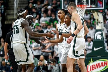 From left, Michigan State's Coen Carr, Kur Teng, Jordan Scott, Jeremy Fears Jr. and Carson Cooper huddle up before a free throw attempt during the second half in the game against Ohio State on Sunday, Feb. 22, 2026, at the Breslin Center in East Lansing.