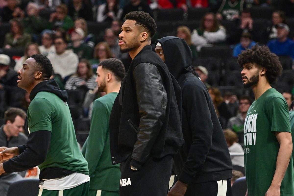 Feb 22, 2026; Milwaukee, Wisconsin, USA; Milwaukee Bucks forward Giannis Antetokounmpo (34) looks on from the bench in the second quarter against the Toronto Raptors as he recovers from a calf injury at Fiserv Forum. Mandatory Credit: Benny Sieu-Imagn Images