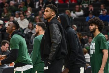 Feb 22, 2026; Milwaukee, Wisconsin, USA; Milwaukee Bucks forward Giannis Antetokounmpo (34) looks on from the bench in the second quarter against the Toronto Raptors as he recovers from a calf injury at Fiserv Forum. Mandatory Credit: Benny Sieu-Imagn Images