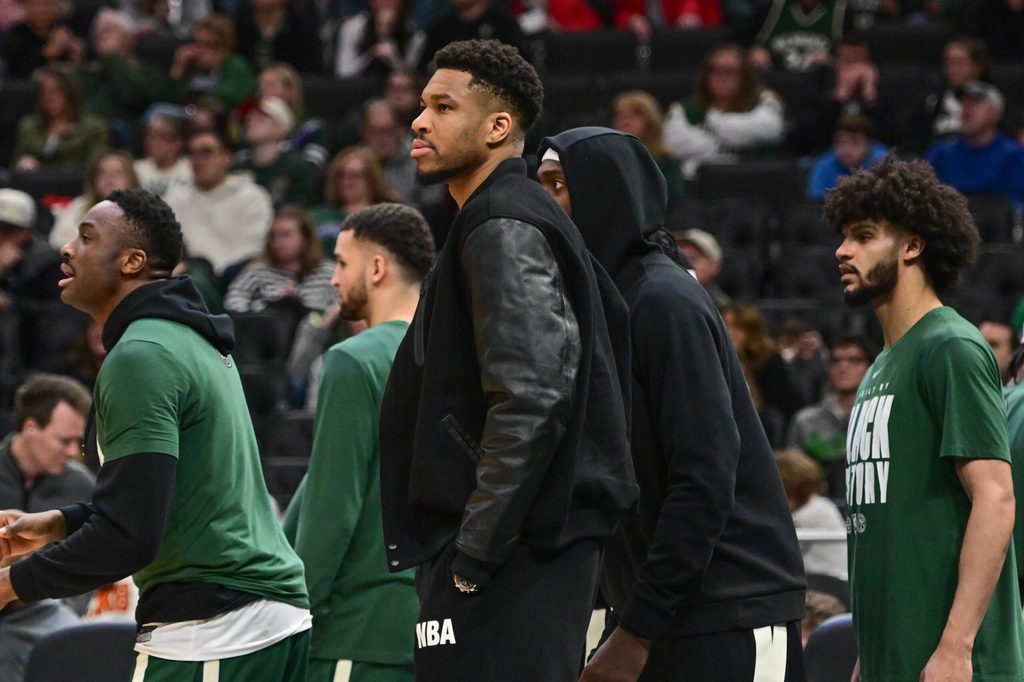 Feb 22, 2026; Milwaukee, Wisconsin, USA; Milwaukee Bucks forward Giannis Antetokounmpo (34) looks on from the bench in the second quarter against the Toronto Raptors as he recovers from a calf injury at Fiserv Forum. Mandatory Credit: Benny Sieu-Imagn Images