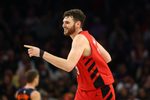 Feb 22, 2026; Phoenix, Arizona, USA; Portland Trail Blazers center Donovan Clingan (23) celebrates a shot against the Phoenix Suns in the first half at Mortgage Matchup Center. Mandatory Credit: Mark J. Rebilas-Imagn Images