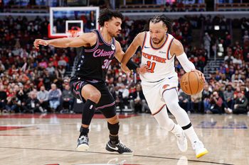 Feb 22, 2026; Chicago, Illinois, USA; New York Knicks guard Jalen Brunson (11) drives to the basket against Chicago Bulls guard Tre Jones (30) during the second half at United Center. Mandatory Credit: Kamil Krzaczynski-Imagn Images