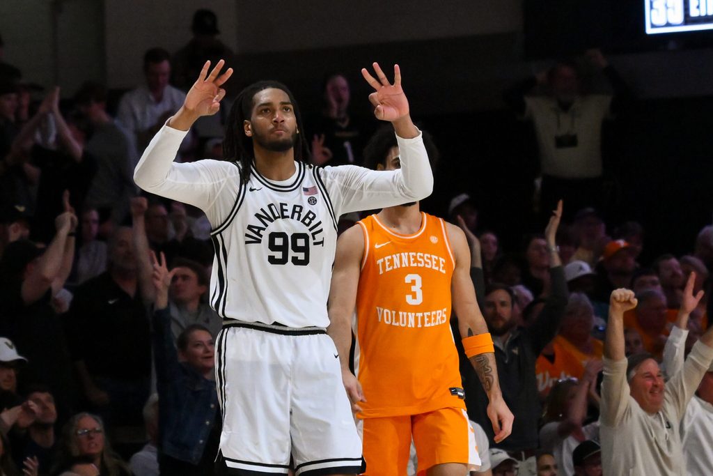 Feb 21, 2026; Nashville, Tennessee, USA; Vanderbilt Commodores forward Devin McGlockton (99) reacts after a made three point basket made by forward Tyler Nickel (5) against the Tennessee Volunteers during the second half at Memorial Gymnasium. Mandatory Credit: Steve Roberts-Imagn Images