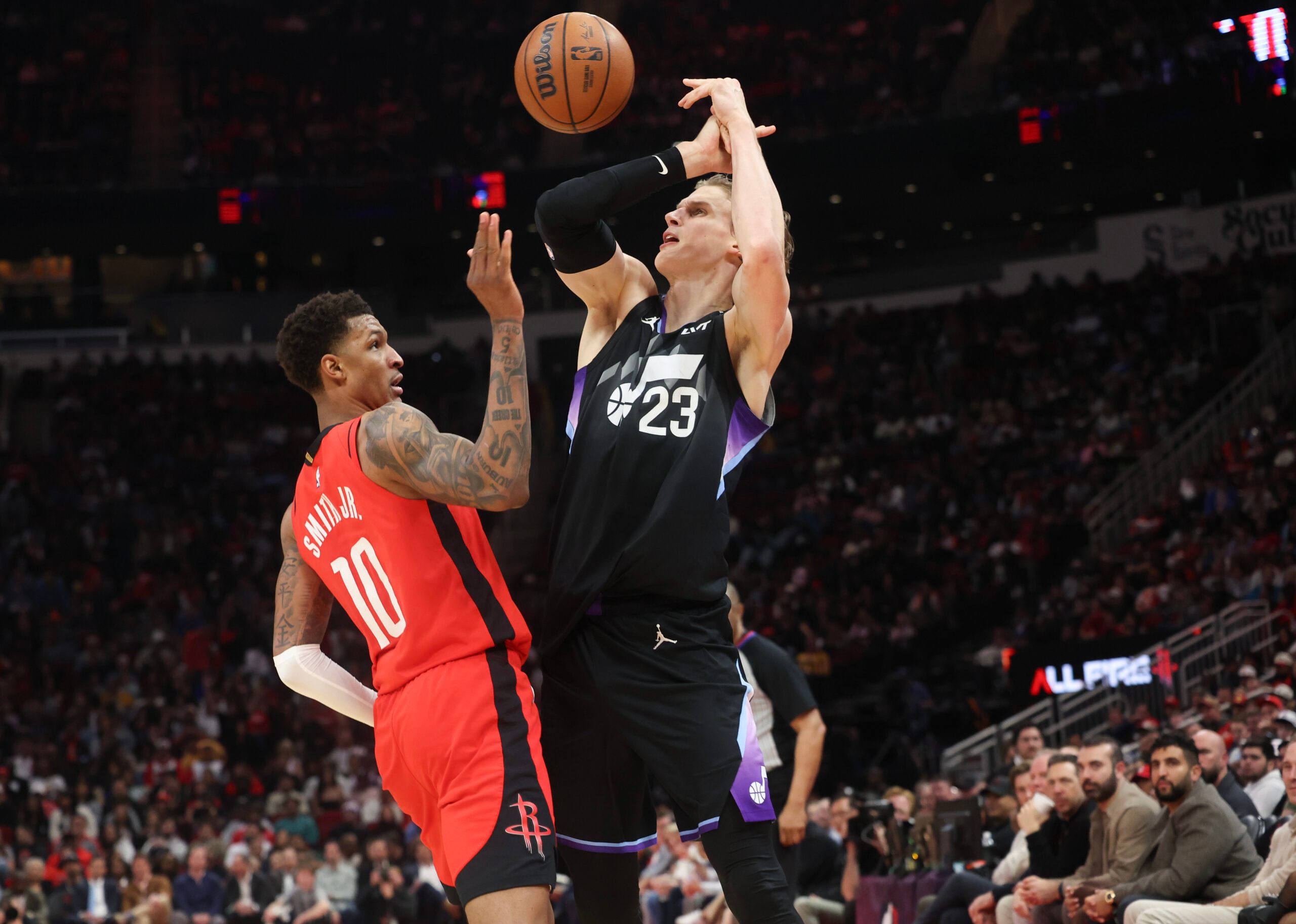 Feb 23, 2026; Houston, Texas, USA;  Utah Jazz forward Lauri Markkanen (23) is defended by Houston Rockets forward Jabari Smith Jr. (10)] in the second quarter at Toyota Center. Mandatory Credit: Thomas Shea-Imagn Images