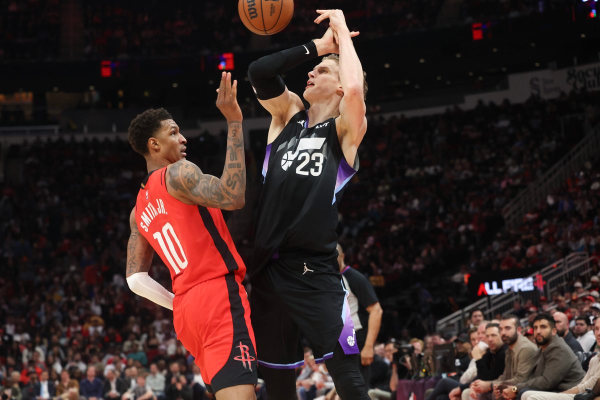 Feb 23, 2026; Houston, Texas, USA;  Utah Jazz forward Lauri Markkanen (23) is defended by Houston Rockets forward Jabari Smith Jr. (10)] in the second quarter at Toyota Center. Mandatory Credit: Thomas Shea-Imagn Images