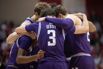 Northwestern's Jake West (3) and the Wildcats huddle up during the Indiana versus Northwestern men's basketball game at Simon Skjodt Assembly Hall on Tuesday, Feb. 24, 2026.