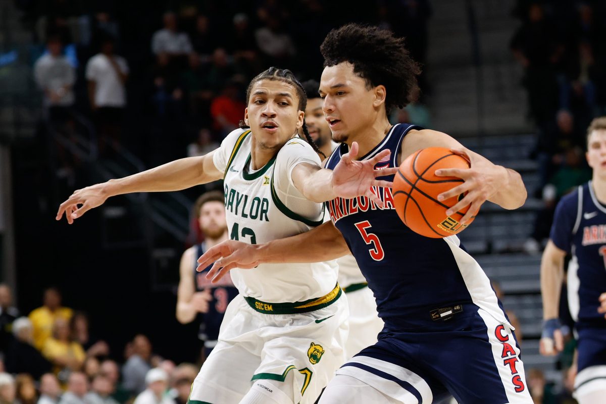 Feb 24, 2026; Waco, Texas, USA; Arizona Wildcats guard Brayden Burries (5) is fouled by Baylor Bears guard Cameron Carr (43) during the second half at Paul and Alejandra Foster Pavilion. Mandatory Credit: Chris Jones-Imagn Images