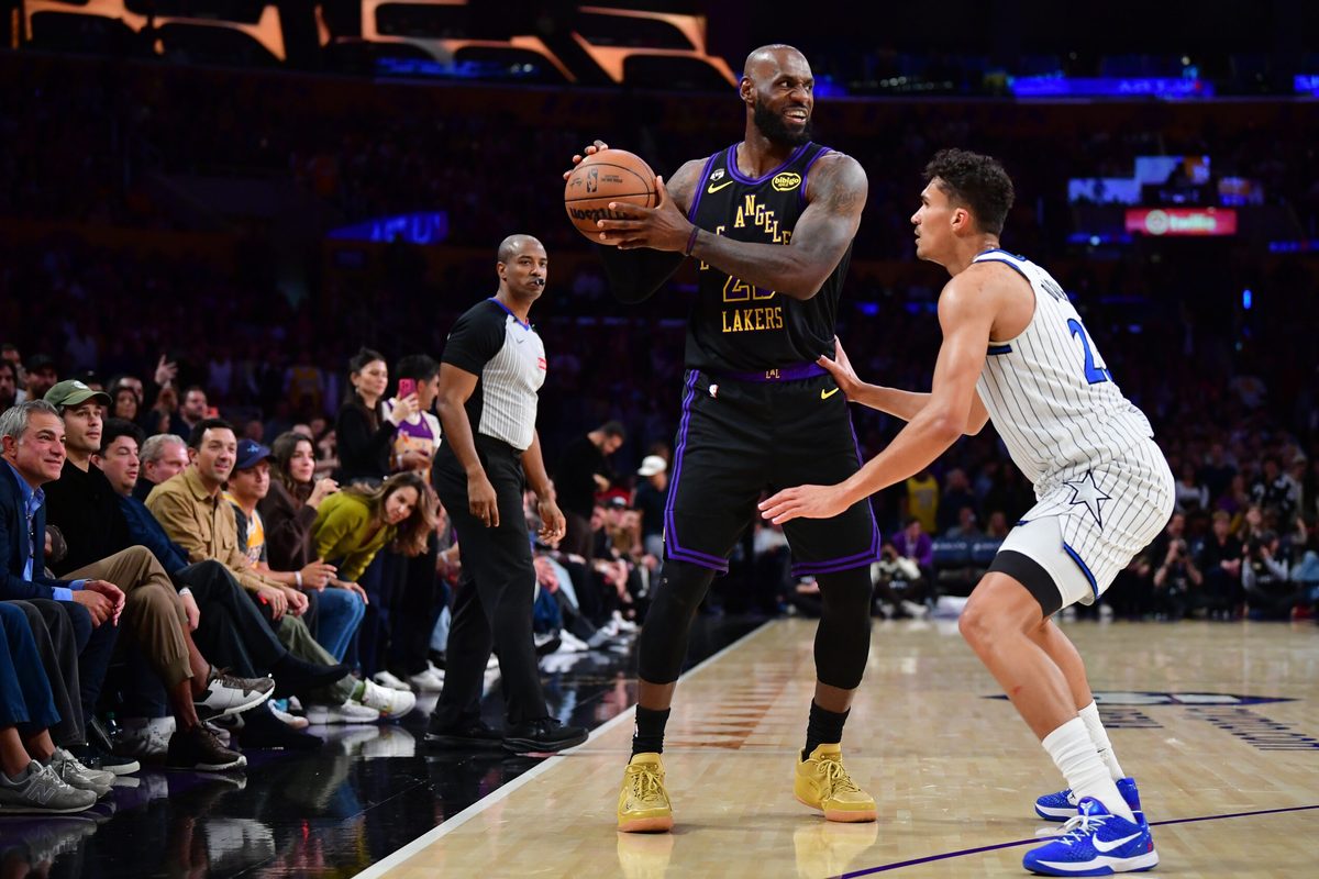 Feb 24, 2026; Los Angeles, California, USA; Los Angeles Lakers forward LeBron James (23) controls the ball against Orlando Magic forward Tristan da Silva (23) during the second half at Crypto.com Arena. Mandatory Credit: Gary A. Vasquez-Imagn Images