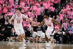 Feb 25, 2026; Providence, Rhode Island, USA; Providence Friars guard Nilavan Daniels (20) celebrates a basket against the Xavier Musketeers with guard Ryan Mela (11) during the second half at Amica Mutual Pavilion. Mandatory Credit: Eric Canha-Imagn Images