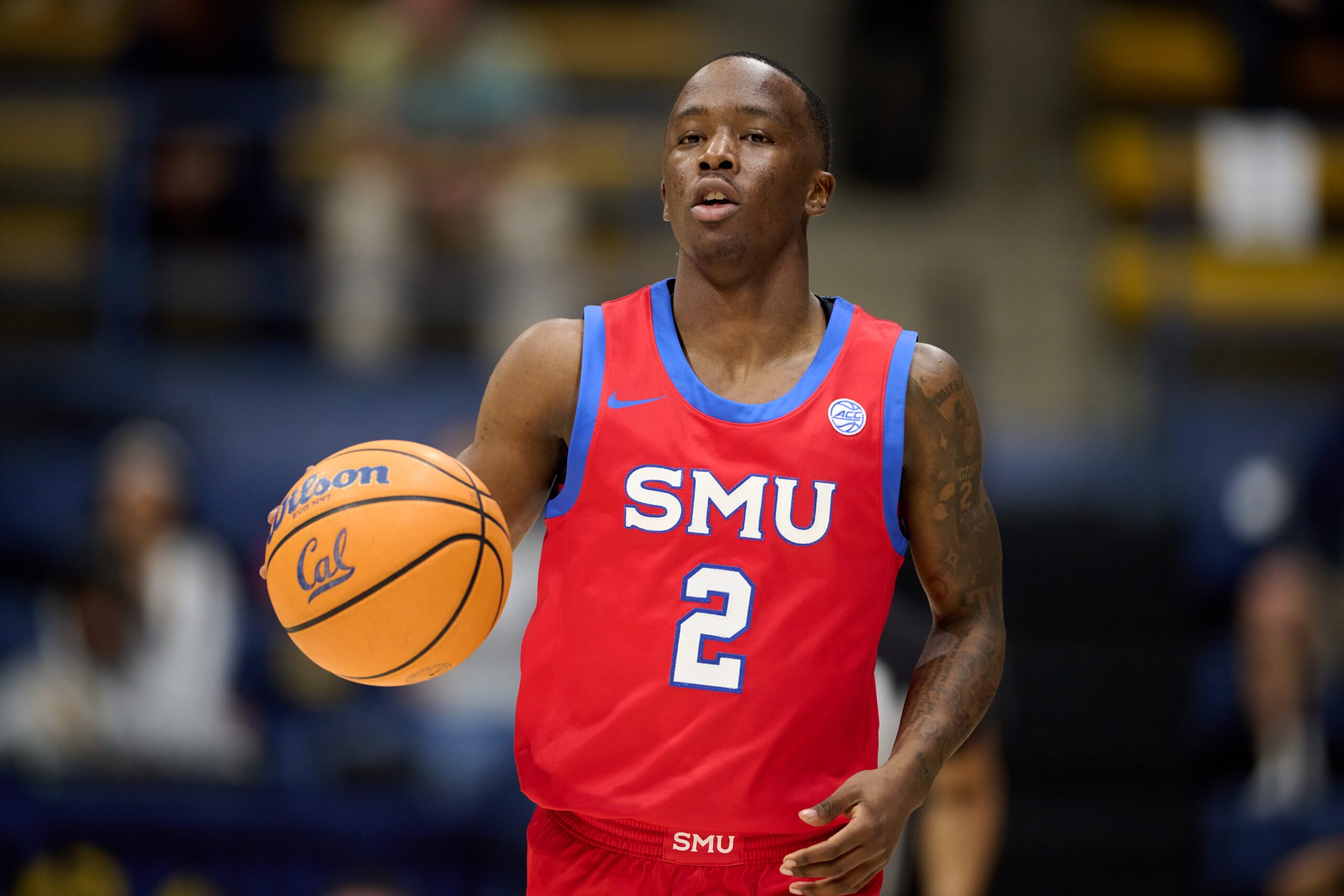 Feb 25, 2026; Berkeley, California, USA; SMU Mustangs guard Boopie Miller (2) brings the ball upcourt against the California Golden Bears during the first half at Haas Pavilion. Mandatory Credit: Robert Edwards-Imagn Images