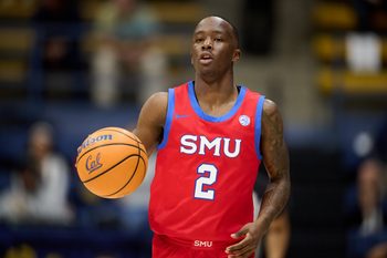 Feb 25, 2026; Berkeley, California, USA; SMU Mustangs guard Boopie Miller (2) brings the ball upcourt against the California Golden Bears during the first half at Haas Pavilion. Mandatory Credit: Robert Edwards-Imagn Images