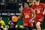 Wisconsin guard John Blackwell moves the ball up the court as the Oregon Ducks host the Wisconsin Badgers on Feb. 25, 2026, at Matthew Knight Arena in Eugene, Oregon.