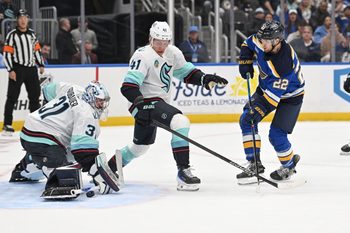 Feb 26, 2026; St. Louis, Missouri, USA; Seattle Kraken goaltender Philipp Grubauer (31) blocks a shot from St. Louis Blues center Pius Suter (22) during the second period at Enterprise Center. Mandatory Credit: Joe Puetz-Imagn Images