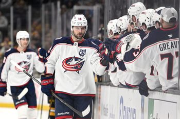 Feb 26, 2026; Boston, Massachusetts, USA; Columbus Blue Jackets center Adam Fantilli (19) celebrates a goal against the Boston Bruins with his bench during the third period at TD Garden. Mandatory Credit: Eric Canha-Imagn Images