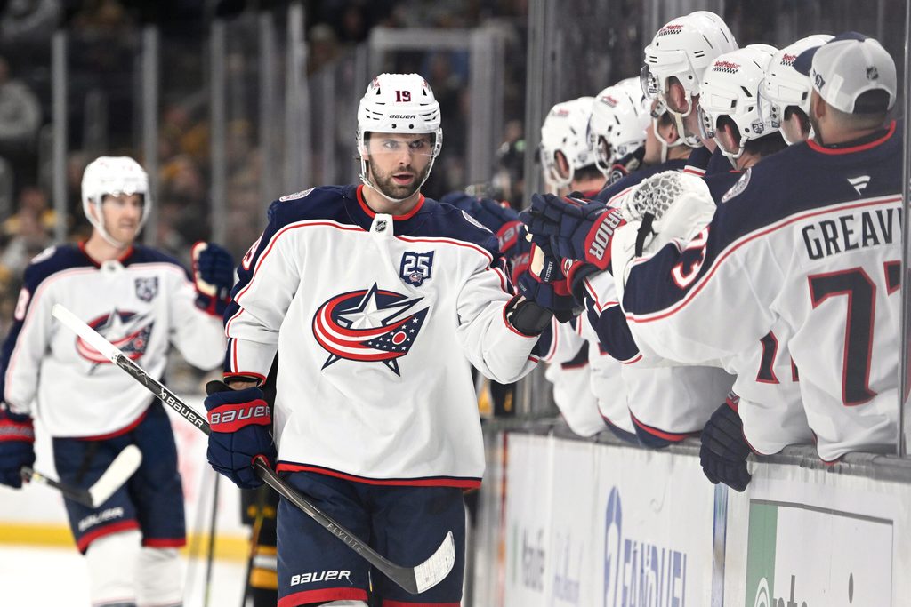 Feb 26, 2026; Boston, Massachusetts, USA; Columbus Blue Jackets center Adam Fantilli (19) celebrates a goal against the Boston Bruins with his bench during the third period at TD Garden. Mandatory Credit: Eric Canha-Imagn Images