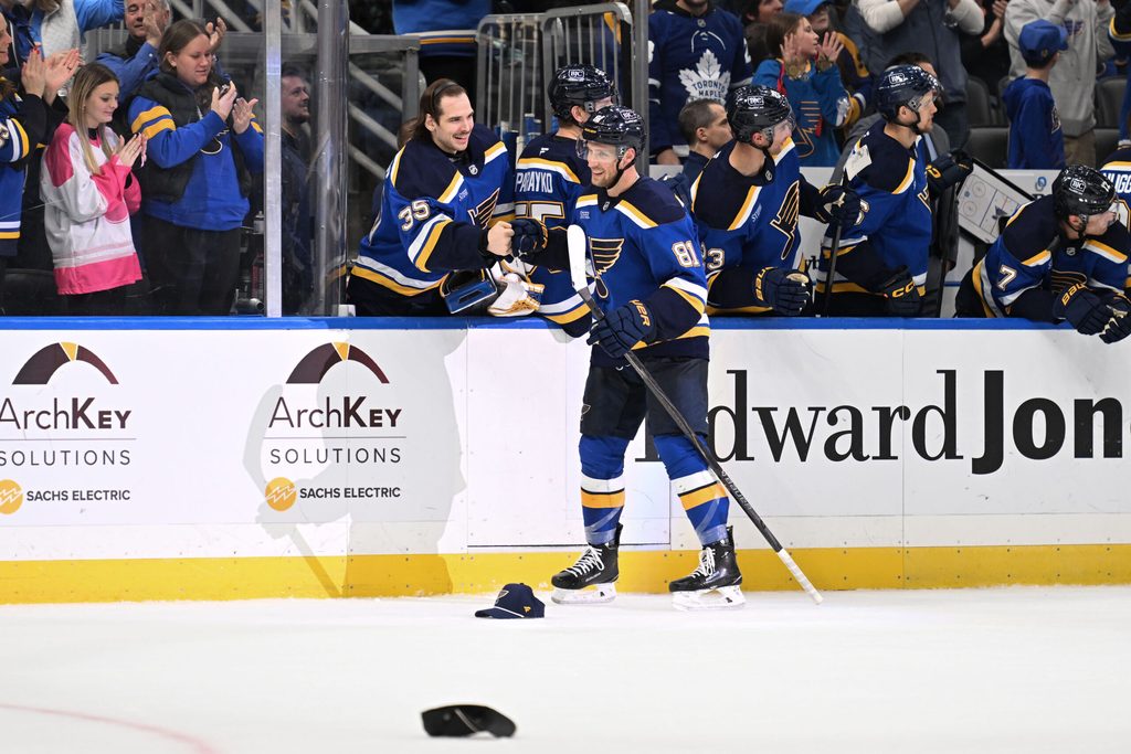 Feb 26, 2026; St. Louis, Missouri, USA; St. Louis Blues left wing Dylan Holloway (81) is congratulated after scoring his third goal for a hat trick against the Seattle Kraken during the third period at Enterprise Center. Mandatory Credit: Joe Puetz-Imagn Images