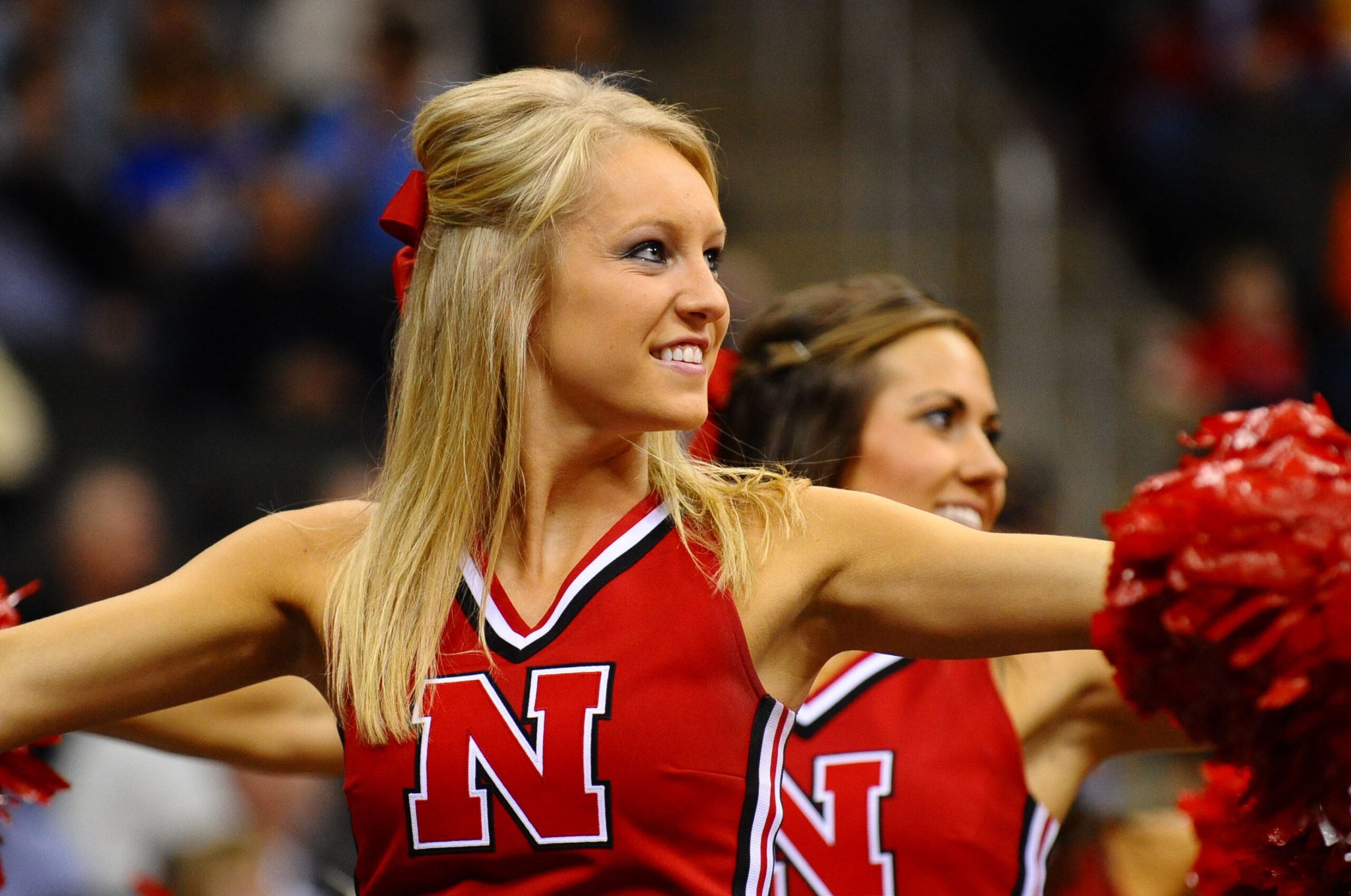 Mar 10, 2010; Kansas City, MO, USA; Nebraska Cornhuskers cheerleaders perform in the second half against the Missouri Tigers during the first round of the mens Big 12 Tournament at the Sprint Center. The Cornhuskers defeated the Tigers 75-60. Mandatory Credit: Ron Chenoy-Imagn Images