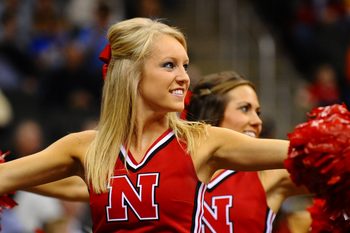 Mar 10, 2010; Kansas City, MO, USA; Nebraska Cornhuskers cheerleaders perform in the second half against the Missouri Tigers during the first round of the mens Big 12 Tournament at the Sprint Center. The Cornhuskers defeated the Tigers 75-60. Mandatory Credit: Ron Chenoy-Imagn Images
