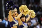 March 18, 2010; San Jose, CA, USA; Washington Huskies cheerleaders perform during the second half against the Marquette Golden Eagles in the first round of the 2010 NCAA mens basketball tournament at HP Pavilion. The Huskies defeated the Golden Eagles 80-78. Mandatory Credit: Kyle Terada-Imagn Images
