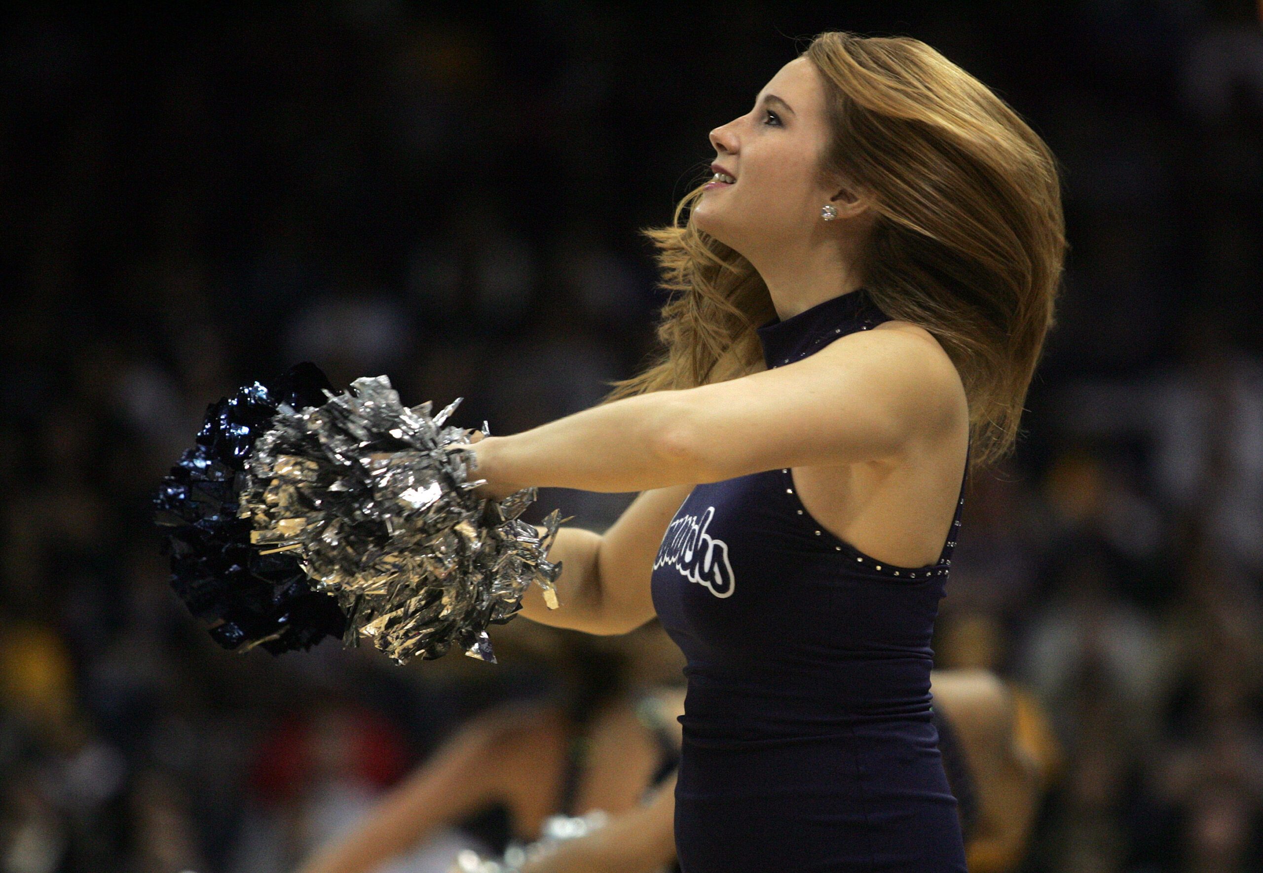 Dec 30, 2011; Norfolk, VA, USA; A Old Dominion Monarchs cheerleader preforms during a time out against the Missouri Tigers at the Ted Constant Convocation Center. Mandatory Credit: Peter Casey-Imagn Images