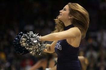 Dec 30, 2011; Norfolk, VA, USA; A Old Dominion Monarchs cheerleader preforms during a time out against the Missouri Tigers at the Ted Constant Convocation Center. Mandatory Credit: Peter Casey-Imagn Images