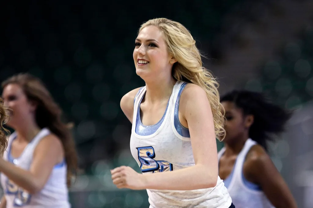 March 02, 2012; Las Vegas, NV, USA; San Diego Toreros cheerleader performs during a timeout against the Portland Pilots during the second half of the quarterfinals of the 2012 West Coast Conference Tournament at Orleans Arena. The San Diego Toreros defeated the Portland Pilots 70-60. Mandatory Credit: Kelley L Cox-Imagn Images