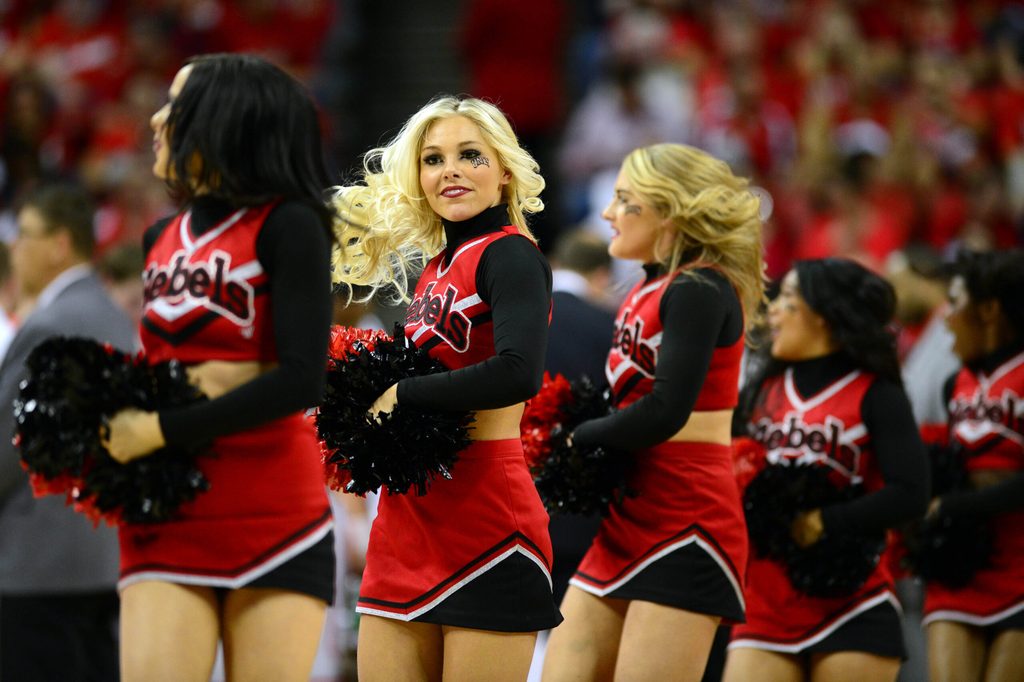 Mar 16, 2013; Las Vegas, NV, USA; New Mexico Lobos cheerleaders perform during the game against the UNLV Rebels in the championship game of the Mountain West tournament at the Thomas & Mack Center. The Lobos defeated the Rebels 63-56. Mandatory Credit: Ron Chenoy-Imagn Images