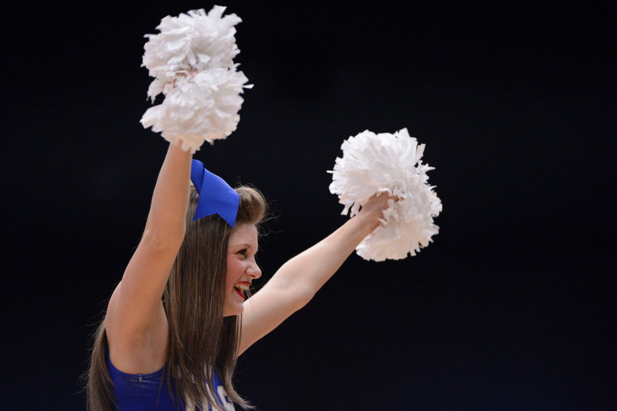 March 24, 2013; Stanford, CA, USA; Tulsa Golden Hurricane cheerleader performs against the Stanford Cardinal during the second half of the first round of the 2013 NCAA womens basketball tournament at Maples Pavilion. Stanford defeated Tulsa 72-56. Mandatory Credit: Kyle Terada-Imagn Images