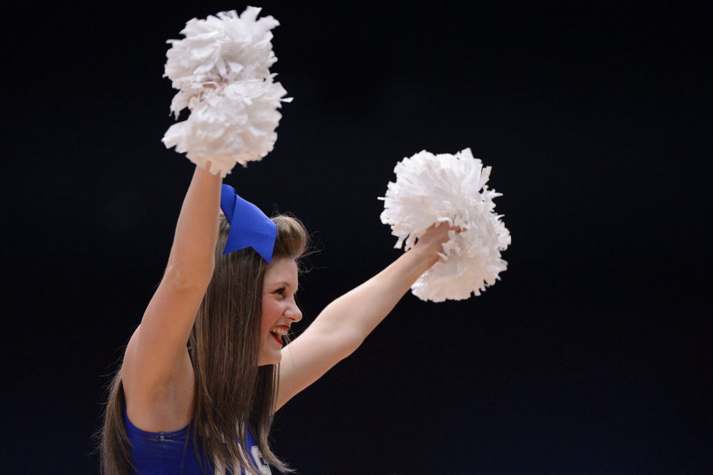 March 24, 2013; Stanford, CA, USA; Tulsa Golden Hurricane cheerleader performs against the Stanford Cardinal during the second half of the first round of the 2013 NCAA womens basketball tournament at Maples Pavilion. Stanford defeated Tulsa 72-56. Mandatory Credit: Kyle Terada-Imagn Images