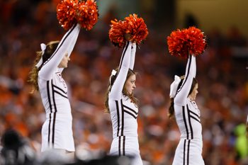 Dec 26, 2013; Detroit, MI, USA; Bowling Green Falcons cheerleaders cheer against the Pittsburgh Panthers during the Little Caesars Pizza Bowl at Ford Field. Mandatory Credit: Rick Osentoski-Imagn Images