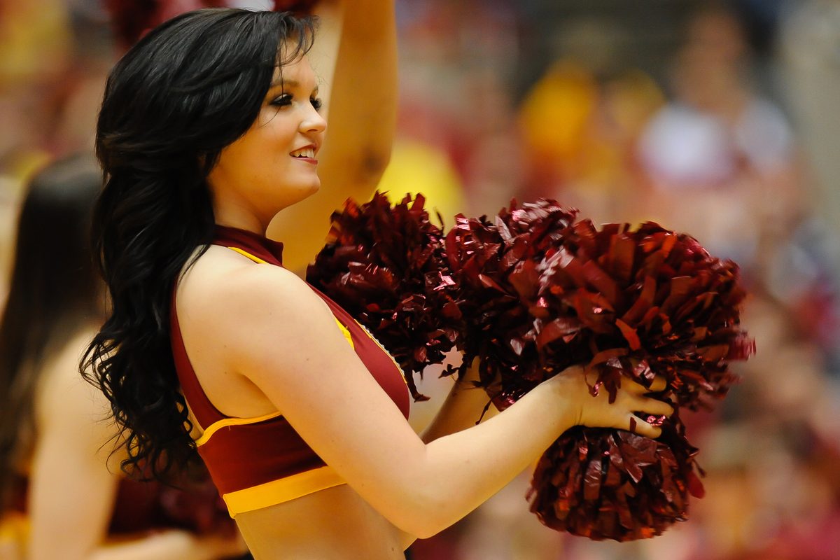Feb 15, 2014; Ames, IA, USA; An Iowa State cheerleader performs at James H. Hilton Coliseum. Iowa State defeated Texas Tech 70-64.  Mandatory Credit: Steven Branscombe-Imagn Images