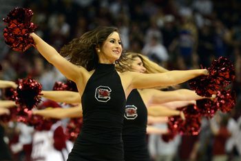 Mar 1, 2014; Columbia, SC, USA; South Carolina Gamecocks cheerleaders perform during a break in the second half against the Kentucky Wildcats at Colonial Life Arena. South Carolina won 72-67.  Mandatory Credit: Rob Kinnan-Imagn Images