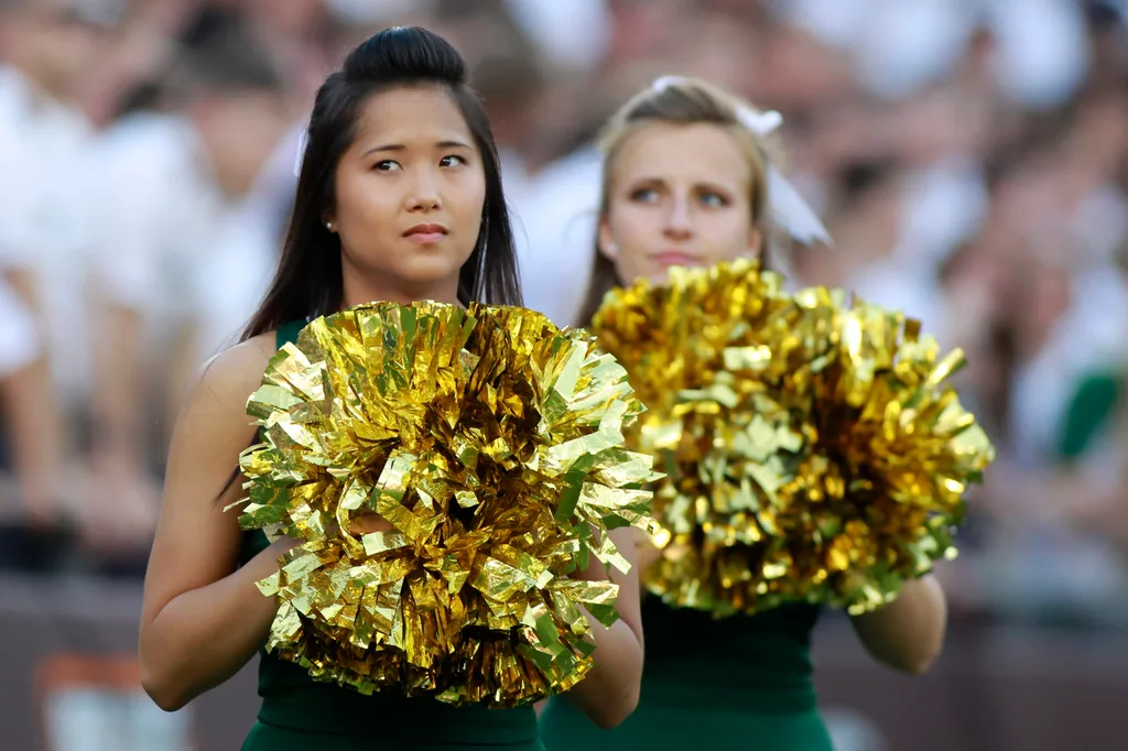 Aug 30, 2014; Blacksburg, VA, USA; William & Mary Tribe cheerleaders during the game against the Virginia Tech Hokies at Lane Stadium. Mandatory Credit: Peter Casey-Imagn Images