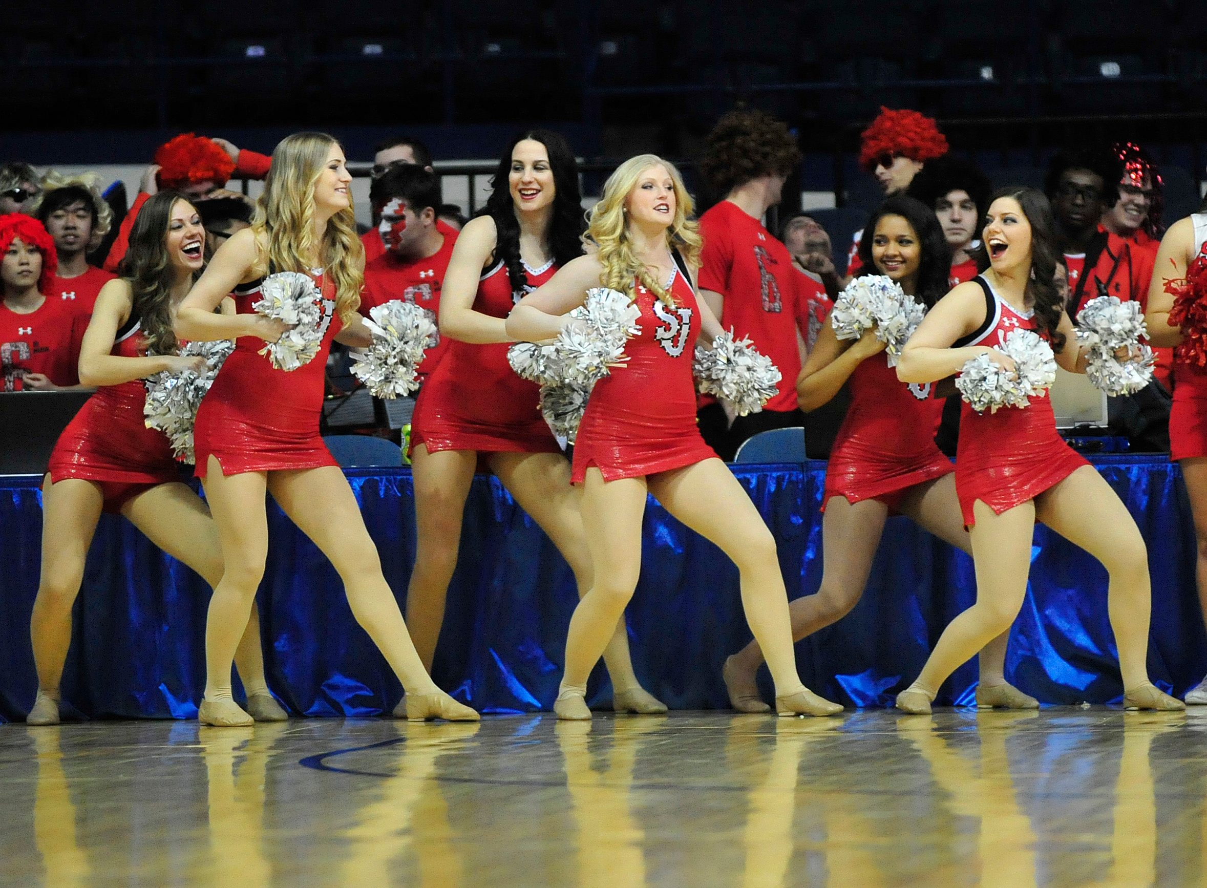 Mar 8, 2015; Rosemont, IL, USA; The St. John's Red Storm cheerleaders dnace during the first half against the Creighton Bluejays at the Allstate Arena. Mandatory Credit: David Banks-Imagn Images