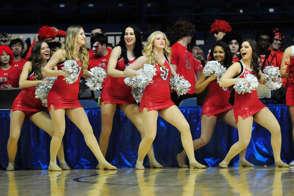 Mar 8, 2015; Rosemont, IL, USA; The St. John's Red Storm cheerleaders dnace during the first half against the Creighton Bluejays at the Allstate Arena. Mandatory Credit: David Banks-Imagn Images