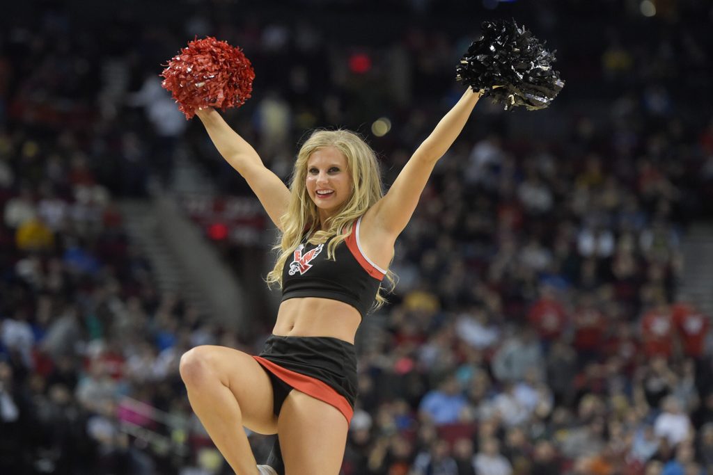 Mar 19, 2015; Portland, OR, USA; Eastern Washington Eagles cheerleader performs against the Georgetown Hoyas during the first half in the second round of the 2015 NCAA Tournament at Moda Center. Mandatory Credit: Kirby Lee-Imagn Images