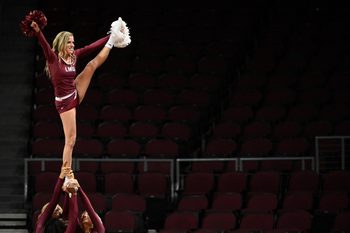 March 5, 2015; Las Vegas, NV, USA; Loyola Marymount Lions cheerleaders perform against the Pepperdine Waves during the second half in the first round of the West Coast Conference tournament at Orleans Arena. The Lions defeated the Waves 68-67. Mandatory Credit: Kyle Terada-Imagn Images