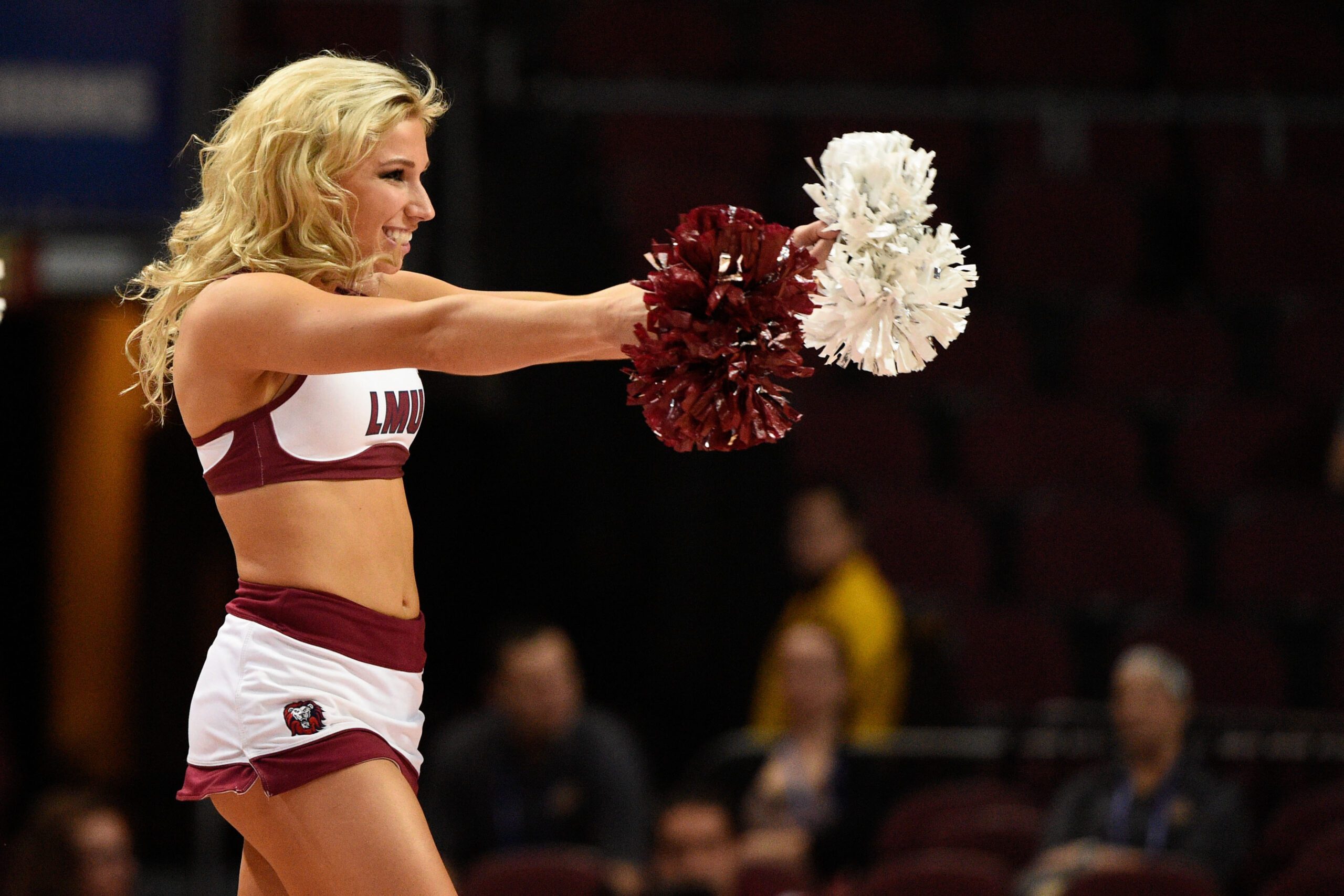 March 6, 2015; Las Vegas, NV, USA; Loyola Marymount Lions cheerleader performs against the Gonzaga Bulldogs during the first half in the quarterfinal round of the West Coast Conference tournament at Orleans Arena. Mandatory Credit: Kyle Terada-Imagn Images