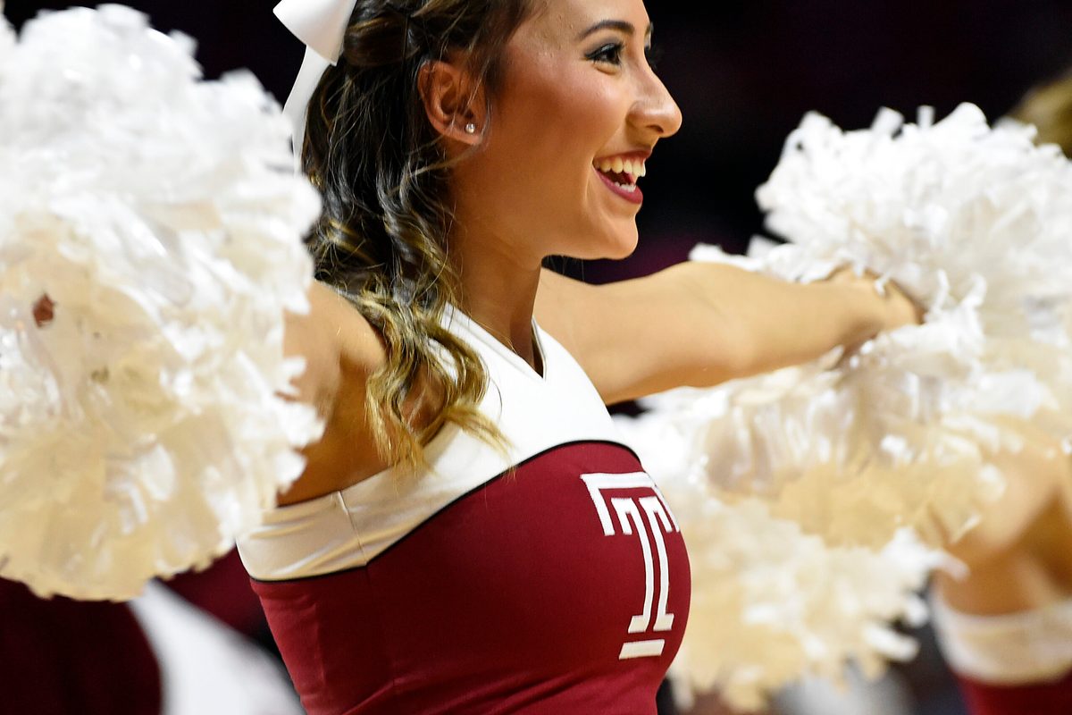 Nov 29, 2015; Philadelphia, PA, USA; Temple Owls cheerleader performs during a timeout against the Delaware Fightin Blue Hens the first half at Liacouras Center. Mandatory Credit: Eric Hartline-Imagn Images