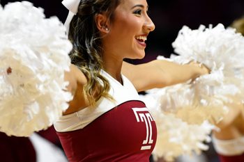 Nov 29, 2015; Philadelphia, PA, USA; Temple Owls cheerleader performs during a timeout against the Delaware Fightin Blue Hens the first half at Liacouras Center. Mandatory Credit: Eric Hartline-Imagn Images