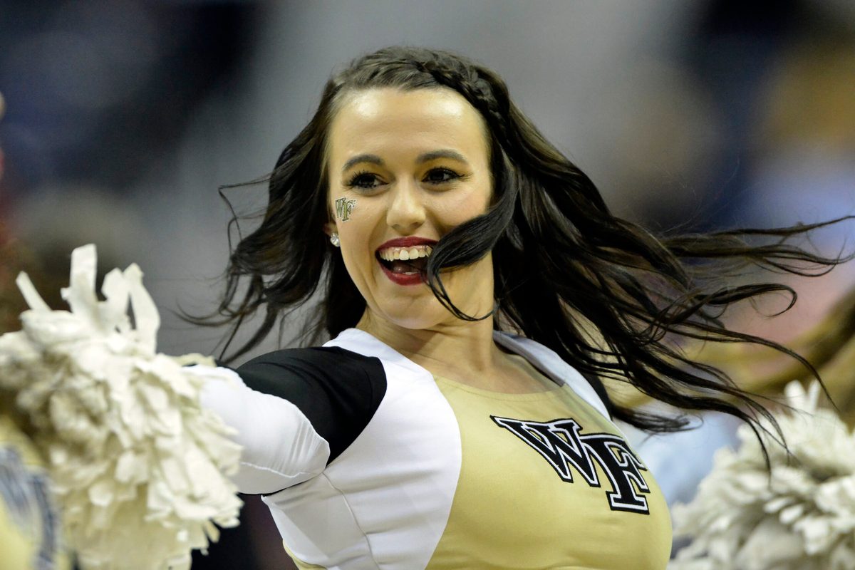 Mar 8, 2016; Washington, DC, USA; Wake Forest Demon Deacons cheerleaders perform in the second half against the North Carolina State Wolfpack during round one of the ACC tournament at Verizon Center. North Carolina State Wolfpack defeated Wake Forest Demon Deacons 75-72. Mandatory Credit: Tommy Gilligan-Imagn Images