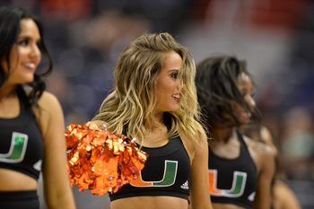 Mar 10, 2016; Washington, DC, USA; Miami Hurricanes cheerleaders perform in the second half against the Virginia Tech Hokies during day three of the ACC conference tournament at Verizon Center. Miami Hurricanes defeated Virginia Tech Hokies 88-82.  Mandatory Credit: Tommy Gilligan-Imagn Images