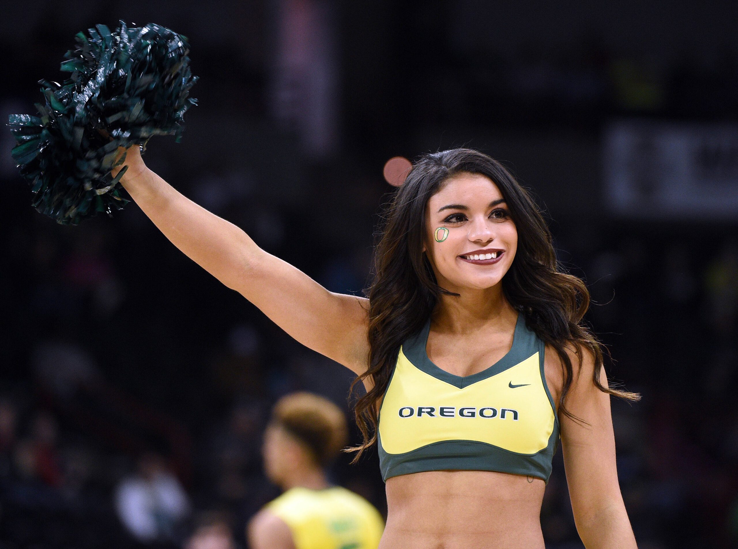 March 18, 2016; Spokane , WA, USA; Oregon Ducks cheerleader performs during the first half at Spokane Veterans Memorial Arena. Mandatory Credit: Kyle Terada-Imagn Images