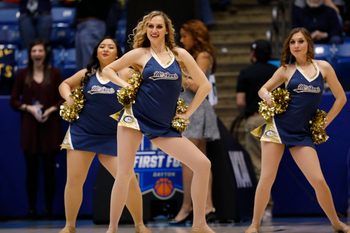 Mar 15, 2017; Dayton, OH, USA; UC Davis Aggies cheerleaders in the first half against the North Carolina Central Eagles in the first four of the 2017 NCAA Tournament at Dayton Arena. Mandatory Credit: Rick Osentoski-Imagn Images