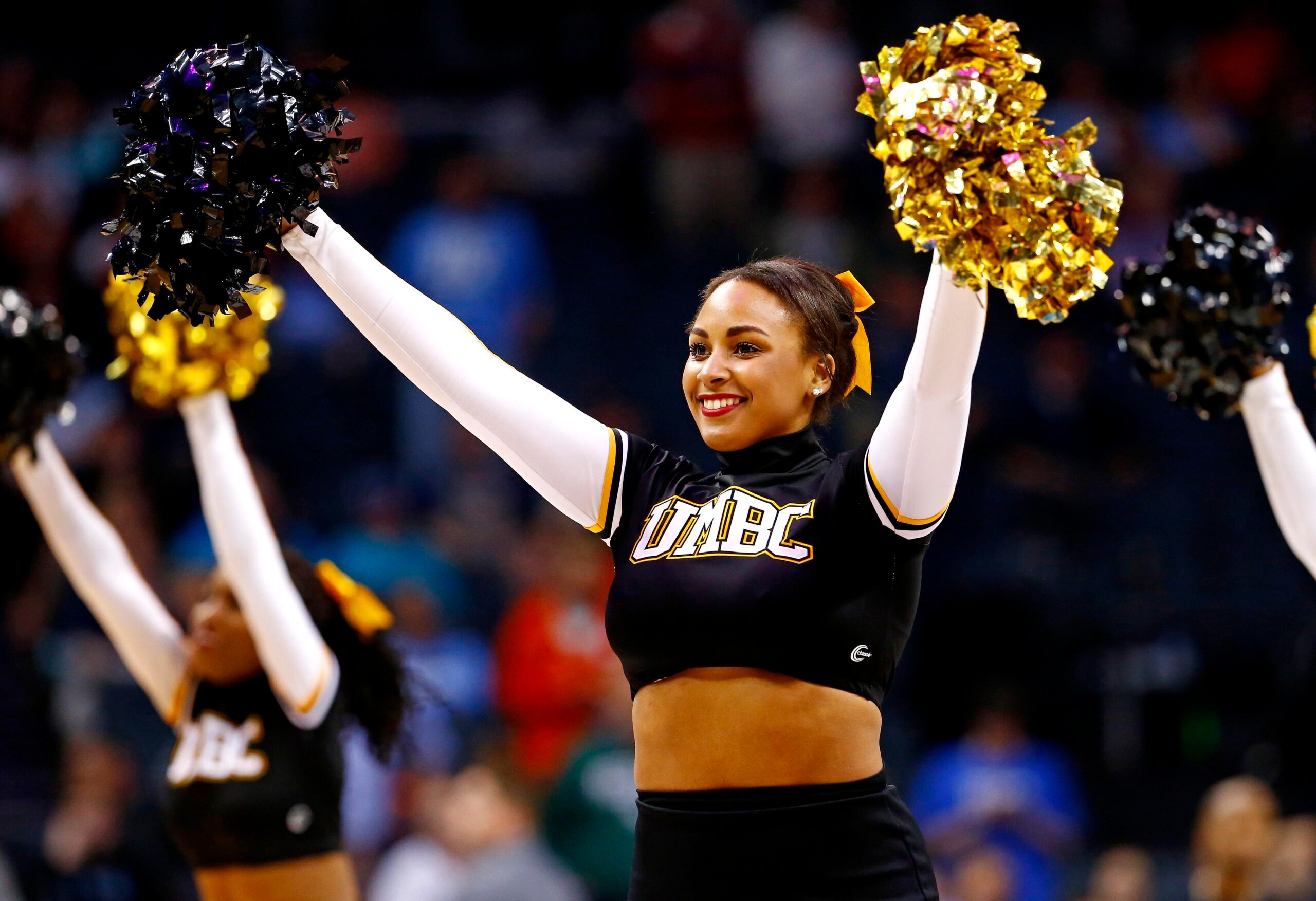 Mar 16, 2018; Charlotte, NC, USA; The UMBC Retrievers cheerleader during half time against the Virginia Cavaliers in the first round of the 2018 NCAA Tournament at Spectrum Center. Mandatory Credit: Jeremy Brevard-Imagn Images
